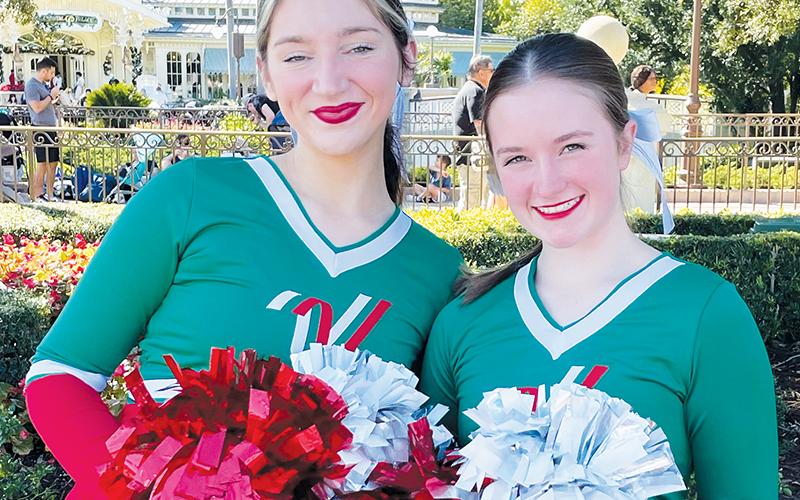 Lady Knight cheerleaders Raylee Knott (left) and Kalyn Cable recently entertained the masses at Disney World.