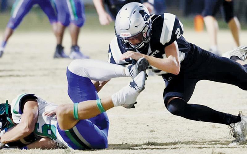 Tillman Adams (24) lowers the boom on Mountain Island Charter’s Caleb Shin during Robbinsville’s second-round playoff victory Nov. 9. Photos courtesy of Miranda Buchanan/Robbinsville High School Yearbook