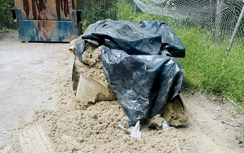 Constant vandalism and a blatant disregard for  stipulations that items such as this insulation-filled bundle of debris – left at the Bear Creek convenience site Oct. 4 – need to instead be dumped at the county’s sanitation center, has propelled the department and commissioners alike to take necessary action.