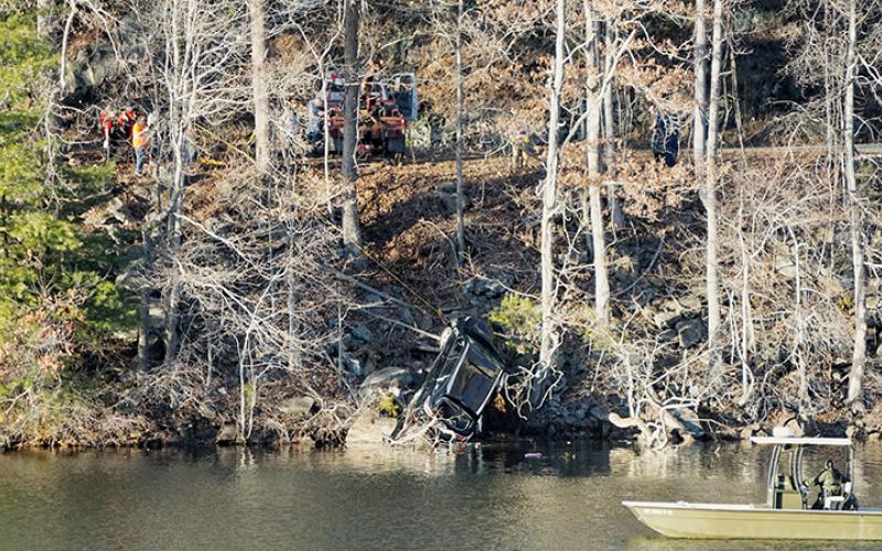 Crews begin to extract a Toyota Highlander from Lake Santeetlah around 5 p.m. Jan. 19, after the SUV crashed into the water during the early morning hours. Jose Alfredo Moreno-Romero, 23, passed away in the accident. Photo by Randy Foster/Community Newspapers, Inc.