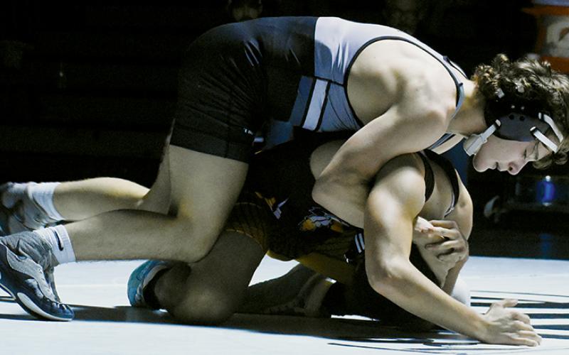 Lleyton Hooper applies a half-nelson during Tuesday’s dual against Cherokee. Photo courtesy of Jacquline Gayosso/Contributing Photographer