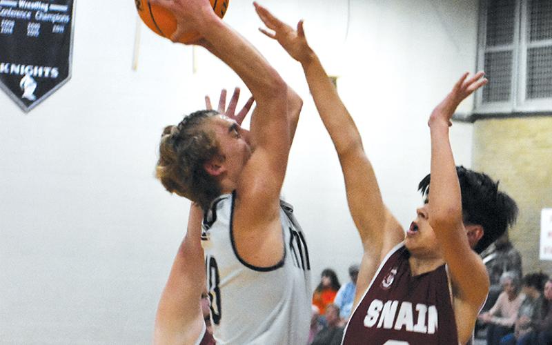 Cameron Allison – shown taking flight in Nov. 30’s home game against Swain County – produced back-to-back, 22-point performances in the last week for  Robbinsville’s 10-0, middle school Black Knights. Photo by Kevin Hensley/sports@grahamstar.com