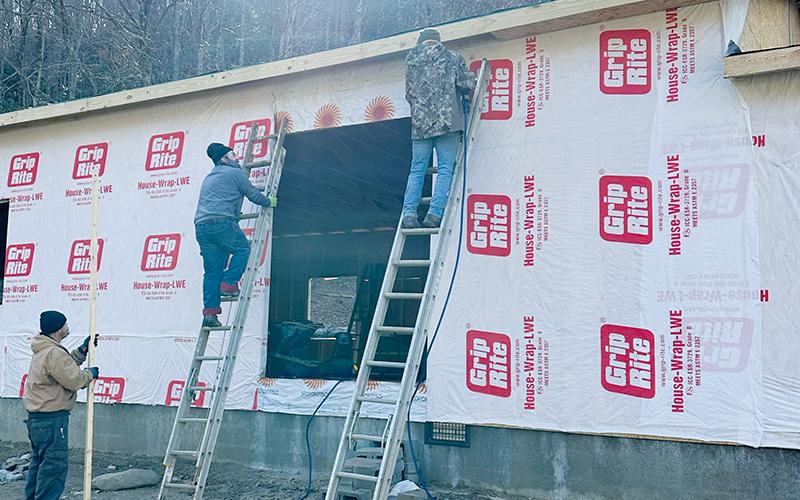 Construction on a Celebrate Recovery building off Hares Creek Road has progressed nicely since last year. Here, John Felton, Andy Girl and Doug Underwood work on the exterior. Photos by Latresa Phillips/The Graham Star