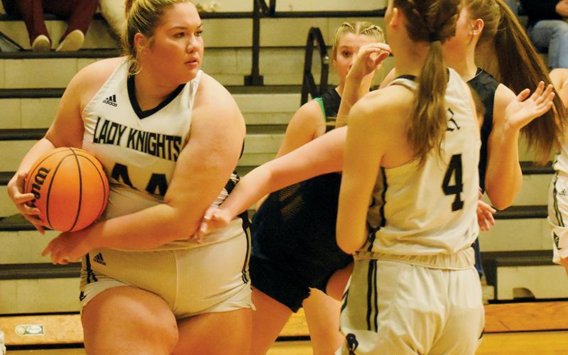Senior center Aubrie Wachacha rips free from a rebound struggle with Highlands on Jan. 4. Wachacha’s early run in the game set the path for Robbinsville to conquer the Lady Highlanders. Photo by Fala Welch/The Graham Star