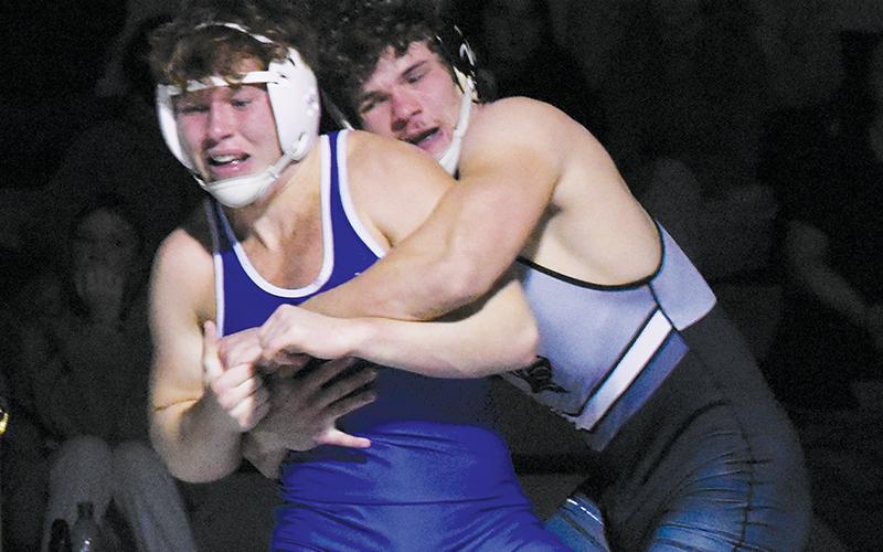 Black Knights senior Kage Williams grapples with Brevard’s Ray Laney during Jan. 3’s home tri-match. Photos by Kevin Hensley/sports@grahamstar.com