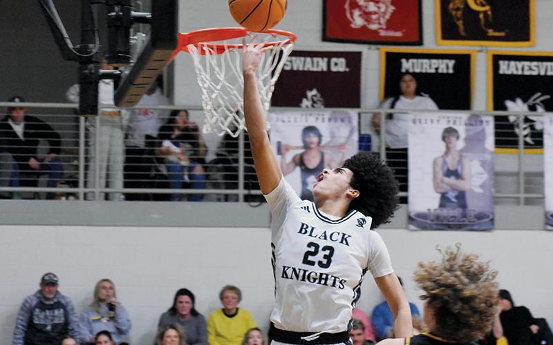 All Murphy’s Ryan Payne (11) could do was look on in awe of Robbinsville junior Darion Ledbetter making this reverse layup look easy during Tuesday’s nightcap with the Bulldogs. Photos by Fala Welch/The Graham Star