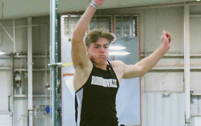 Cooper Adams competed in both the boys long and triple jump events inside Winston-Salem’s JDL Fast Track.