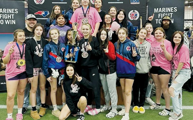 Members of the Robbinsville Middle School Lady Knights celebrate after winning the 42nd Annual North Carolina Junior High State Championship on Saturday. Photos courtesy of Sarah Orr/Lady Knights Wrestling