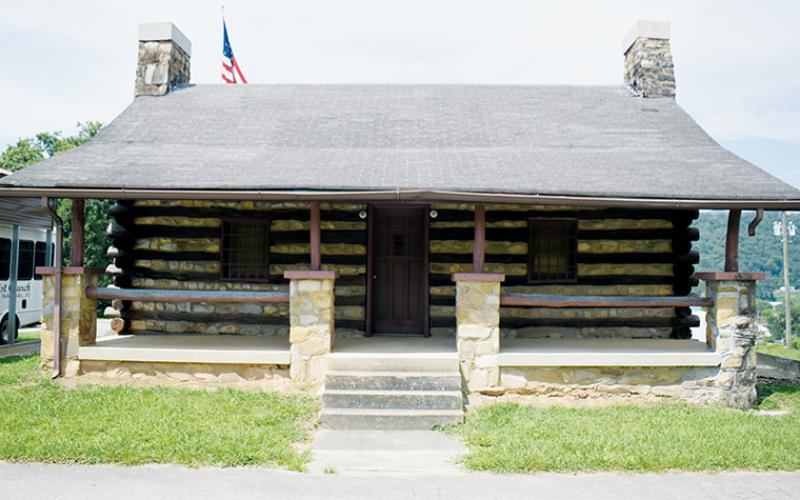 Supporters of “The Hut” sought the backing of the Graham County Board of Commissioners.  Significant progress has recently been made in the effort to preserve the historic cabin, which sits outside of Robbinsville First Baptist Church. Photo by Kevin Hensley/editor@grahamstar.com