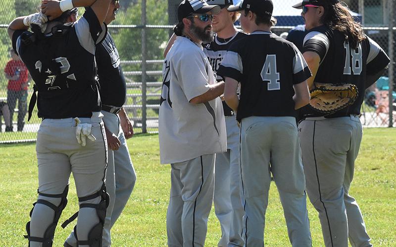 Robbinsville head coach Brent Icenhower goes over strategy with the Black Knights in-between innings at May 1's home game against Murphy. Photo by Jacquline Gayosso/The Graham Star