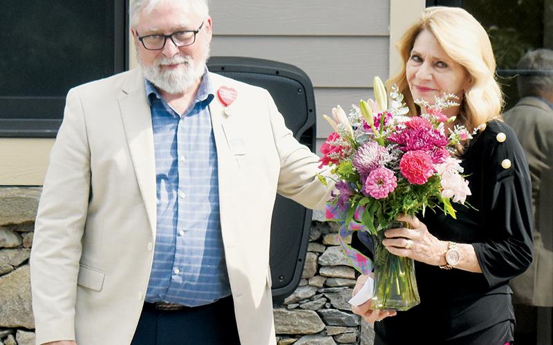 For her tireless work as an advocate for urgent-care availability in Graham County, transit director Juanita Colvard was given her flowers during Tuesday’s AdventHealth open house. Presenting Colvard with the bouquet is AdventHealth Hendersonville Physician Services Director of Operations Kevin Morgan. Photos by Kevin Hensley/editor@grahamstar.com