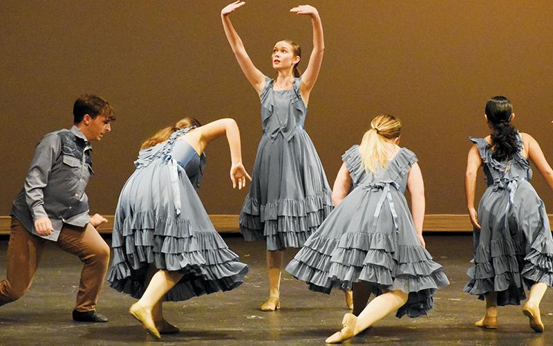 Anna Wehr is not your typical teenage girl: she does not enjoy being the center of attention – unless she’s  performing in front of a crowd on behalf of the Stardance Performing Arts dance studio. Here, a lyrical number titled “Dust Bowl” temporarily sees her peers form a semi-circle around Wehr. Photos by Kevin Hensley/editor@grahamstar.com