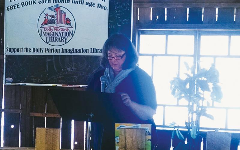 Mary Griffin speaks at a 2019 GREAT meeting in Robbinsville, advocating for the Dolly Parton Imagination Library. The beloved face of the Graham County Public Library passed away Aug. 22.