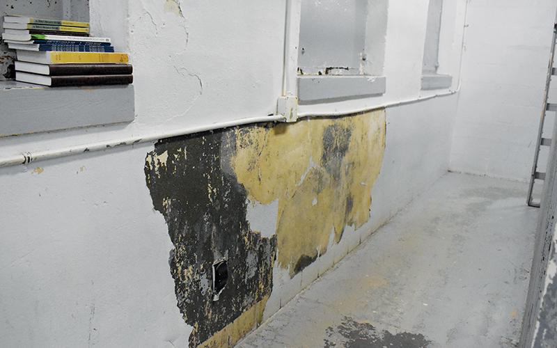 Despite numerous touch-ups over the years, the Graham County Detention Center still has problematic areas where paint is peeling off the walls in both the cell block and administrative offices.
