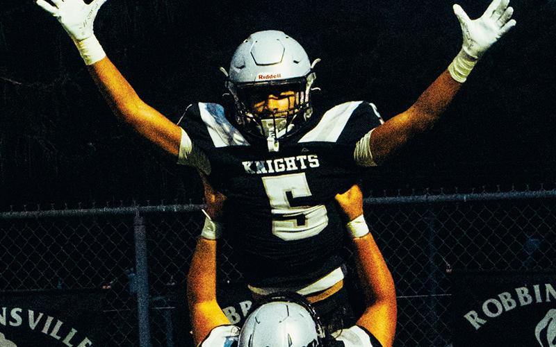Darion Ledbetter (5) celebrates with Tytan Teesateskie after scoring his first of two touchdowns during Sept. 12’s rout over Copper Basin. Photos by Royce Worbington/The Graham Star