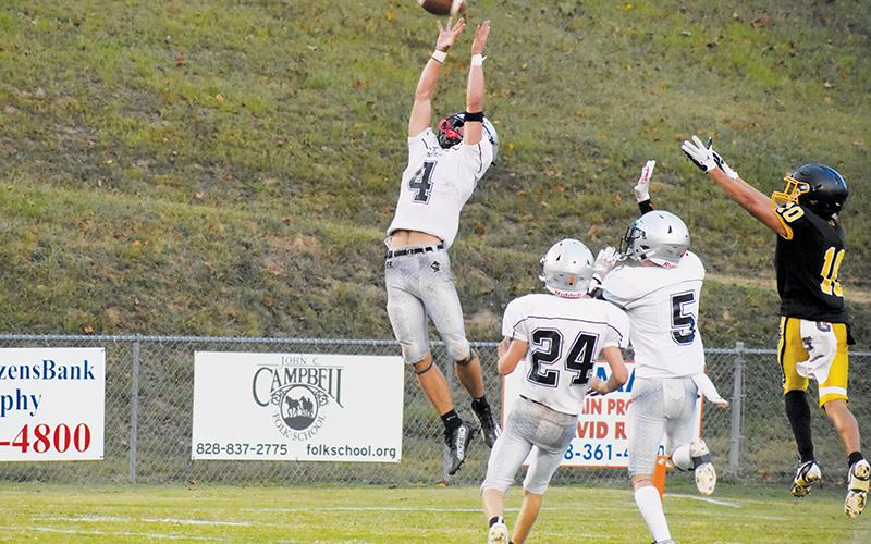 Cameron Allison (4) had other plans for Peyton Baine's pass to Brodie Betts (11), making a mid-air denial by roping in his second interception of the game Monday at Murphy. Allison's pick transitioned into Robbinsville scoring the game-clinching touchdown. Photos by Kevin Hensley/sports@grahamstar.com