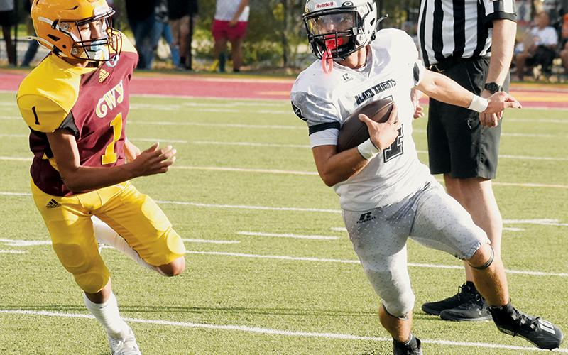 Cameron Allison ran wild on defense for the Black Knights during Sept. 5’s Smoky Mountain Conference opener at Cherokee, scoring on an interception and punt return in Robbinsville’s trouncing of the Braves. Photos by Kevin Hensley/sports@grahamstar.com