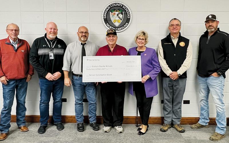 Rep. Karl Gillespie (R-Franklin; second from right) visited Graham County Schools on Friday, to formally present a check in the amount of $42 million from the North Carolina Department of Public Instruction. The grant money will go toward the construction of a new Robbinsville Elementary School. Photo by Kevin Hensley/editor@grahamstar.com
