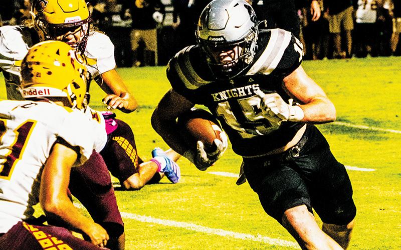 Senior Roman Jones prepares to lower the boom on Cherokee’s Kingston Welch en route to one of his five trips into the end zone Friday. Photos by Royce Worbington/The Graham Star