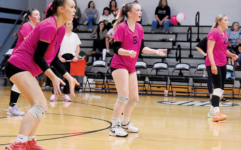 The Lady Knights prepare to defend the back row Tuesday against Swain County. Pictured are Claire Barlow, Daphne Barlow (5), Ryn Hooper and Liz Carpenter (20). Photo by Cheyanne Geyer/The Graham Star