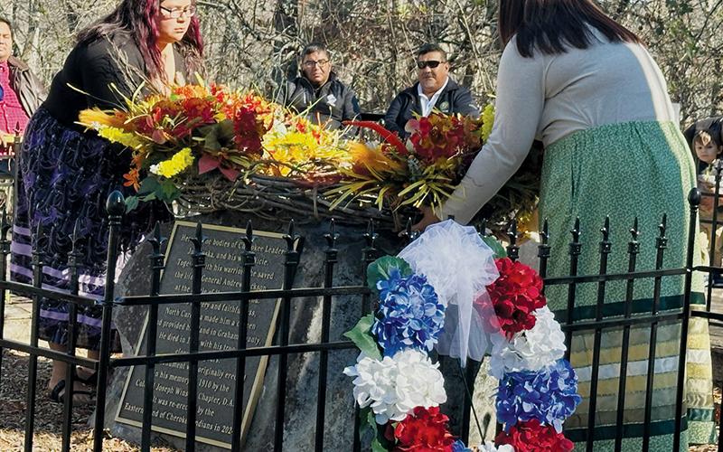 Jenni Junaluska and Cecilia Arrowood lay the ceremonial wreath on Chief Junaluska’s grave to help memorialize the famed Native American on Nov. 13. Jenni is a sixth-generation descendant of the chief. Photos by Latresa Phillips/The Graham Star