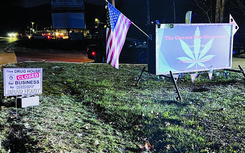 The Greener Side Dispensary was 1-of-3 local businesses that was part of “Operation Dirty Laundry,” which was carried out Friday afternoon. By nightfall, the Graham County Sheriff’s Office had put up a temporary sign outside the establishment to note the success of the operation. Photo by Kevin Hensley/editor@grahamstar.com