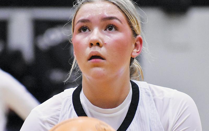Senior Liz Carpenter sizes up a free throw Monday against Smoky Mountain. Through the first three games of the year, Carpenter is averaging 15.3 points per game. Photo by Bella Eddings/The Graham Star