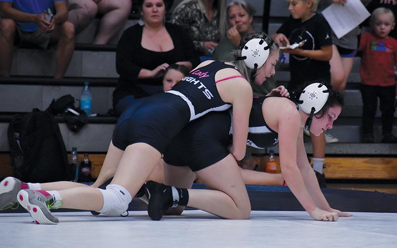 Latesha Orr grabs top control on Velvet Carver during Nov. 7’s scrimmage. Photo by Bella Eddings/The Graham Star