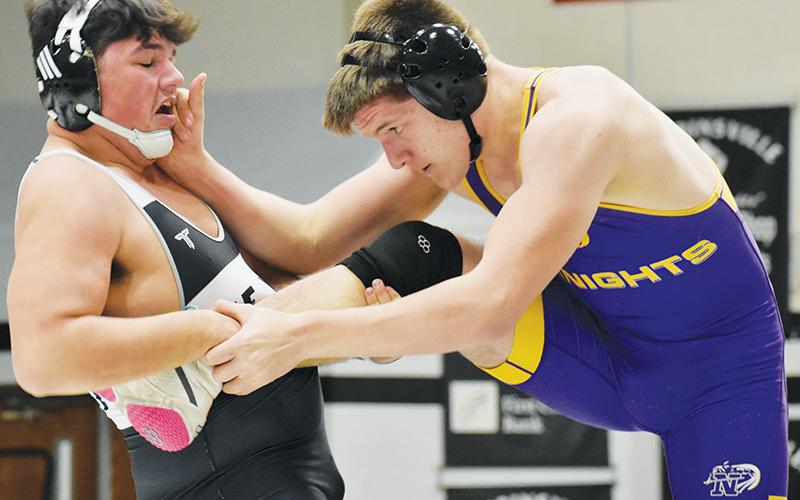 Robbinsville’s Kellen Ensley brushed off a desperate attempt by North Henderson’s Aden Slusser to break up this standing single-leg to win the 215-pound bout in the third period Jan. 22. Photos by Bella Eddings/The Graham Star