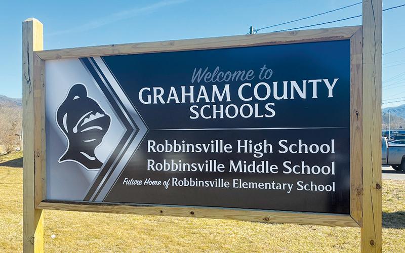 This newly-installed sign sits at the intersection of Black Knight Drive and U.S. 129 (Rodney Orr Bypass), directing travelers to the “new” entrance to both Robbinsville Middle and High schools. The intersection opened in November 2019 – and as the sign indicates, more expansion is in the works, as the intersection will become a busy hub in Robbinsville once the new elementary school is constructed. Photo courtesy of Robert Moody/Graham County Schools