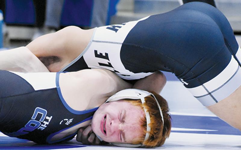 Adair Panama puts Polk County’s Liam Jackson in a world of hurt during the Feb. 5 third-round, dual-team  postseason match. Robbinsville won the dual, but fell in the regional final to Mount Airy. Photos by Kensie Belk/The Graham Star