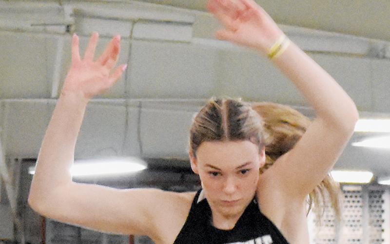 Claire Barlow, long and triple jumps.
