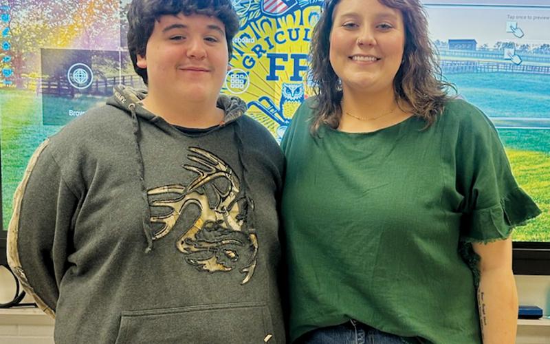 Robbinsville High School freshman Nick Wilson has been selected to participate in the Western North Carolina Dairy Beef Feeder Calf Program. He is pictured alongside Robbinsville High agricultural teacher Adrienne Watts. Photo by Latresa Phillips/The Graham Star