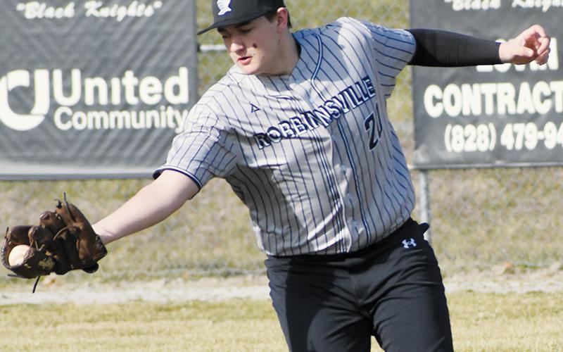 Avery Webster makes a running catch in right field Monday against Rosman. Photo by Lexie Anderson/The Graham Star