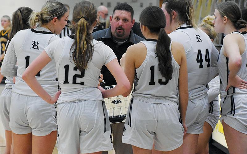Lucas Ford draws up a play during a timeout Feb. 15, in the quarterfinals of the Smoky Mountain  Conference tournament against Murphy. Ford stepped down as the Lady Knights head coach at the conclusion of the season. Photo by Kevin Hensley/sports@grahamstar.com