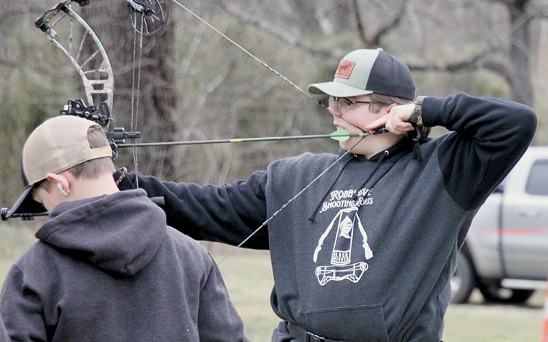 Robbinsville High School’s Murphy Shanahan draws back during Feb. 22’s archery competition in Marble. Photo courtesy of Cheri Lynn/Robbinsville Shooting Sports