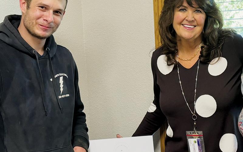 The Graham County Department of Public Health was 1-of-20 area agencies that received a Starlink router, thanks to an effort spearheaded by local resident Judy Carpenter. Health department director Donna  Stephens (right) is pictured with technician Dylan  Wiggins, who installed the router.