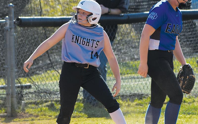 Allie Phillips puts on the brakes after reaching third base Friday against Hiwassee Dam/Ranger. Photo by Lexie Anderson/The Graham Star