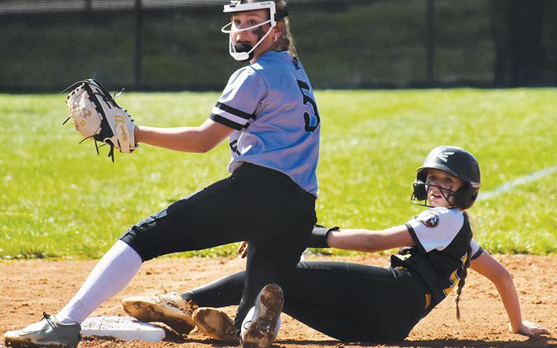Middle school Lady Knight Lakin Orr awaits the call after tagging a Murphy baserunner during April 1’s home game. Photos by Bella Eddings/The Graham Star