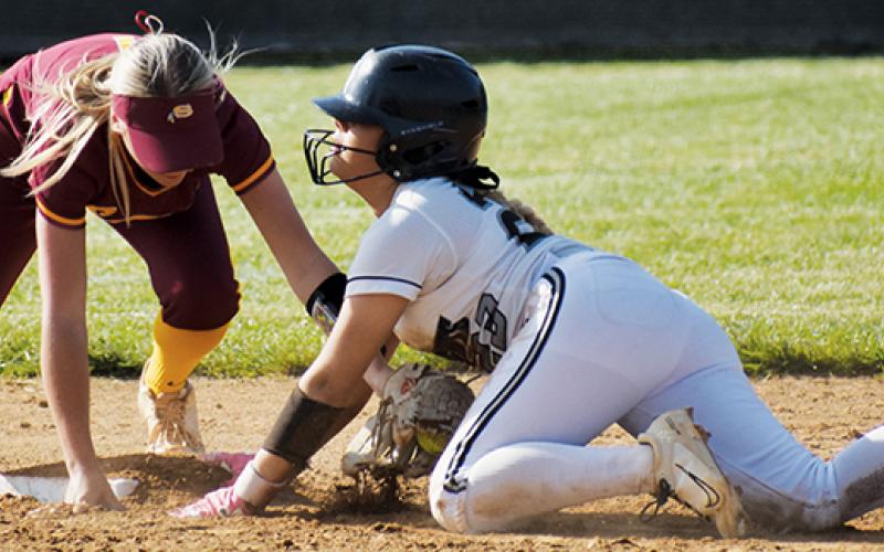 Suri Watty slides safely into second during Friday's playoff game against South Stokes. Along with Presley Caylor, Watty had a 3-for-4 afternoon against the Sauras.