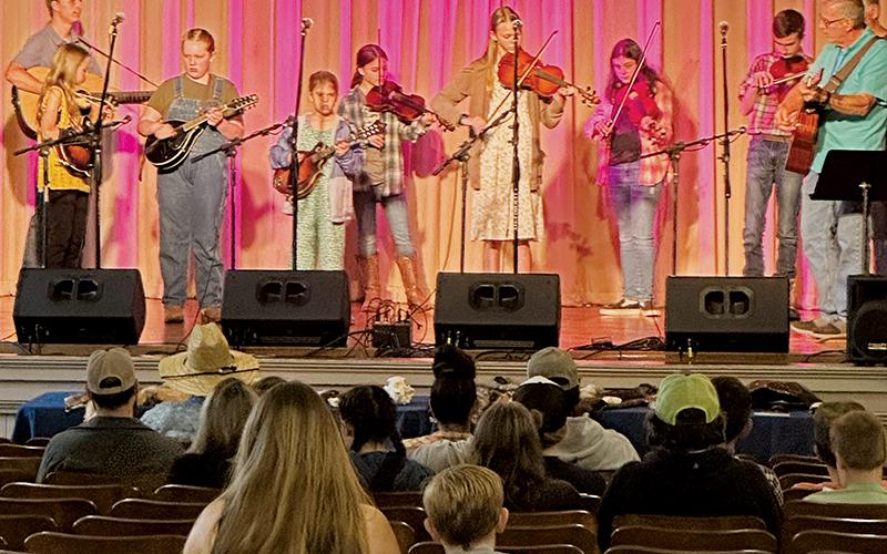 Members of the Stecoah JAM (Junior Appalachian Musicians) program kept attendees entertained at Saturday's SpringFest. Photos by Latresa Phillips/The Graham Star
