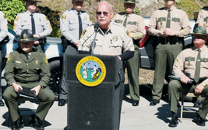 Curtis Cochran speaks at the Border-to-Border Tail of the Dragon Program Launch, which was held at Deals Gap Motorcycle Resort on June 13, 2023. Cochran was suspended from his duties as Swain County Sheriff on Friday, following his arrest in connection to alleged, recent sexual misconduct. Photo by Kevin Hensley/editor@grahamstar.com