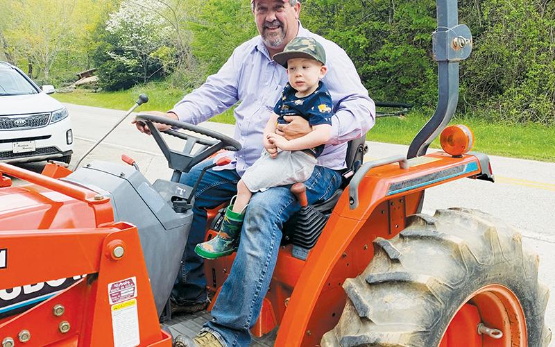 Scott Roper has a long-standing tradition of involving his grandchildren in helping with his garden. Five years ago, he proudly brought along Lennox Burke for a ride on his tractor.