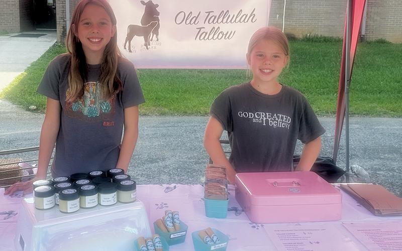 Siblings Emerie and Enslie Phillips sell products straight from the farm each Saturday at 80 Knight Street in Robbinsville, at “Old Tallulah Tallow.”