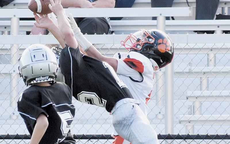 Devin Burchfield intercepts a Rosman pass during the Sept. 11 JV football game. Photo by Lexie Anderson/The Graham Star