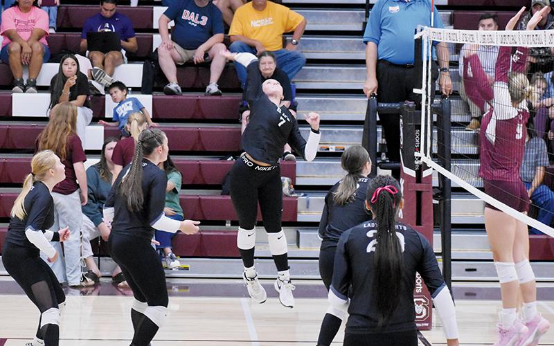 Ella McGuire leaps for a kill attempt Sept. 4 at Swain County. Photo by Kevin Hensley/sports@grahamstar.com