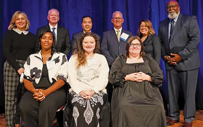 Haylee Van Deusen (seated, center) received the NCWorks Governor’s Young Adult Award for Distinction at a ceremony in Greensboro on Oct. 17. The Robbinsville native is shown among other Governor’s Award winners recognized at the event. Photo courtesy of North Carolina Department of Commerce