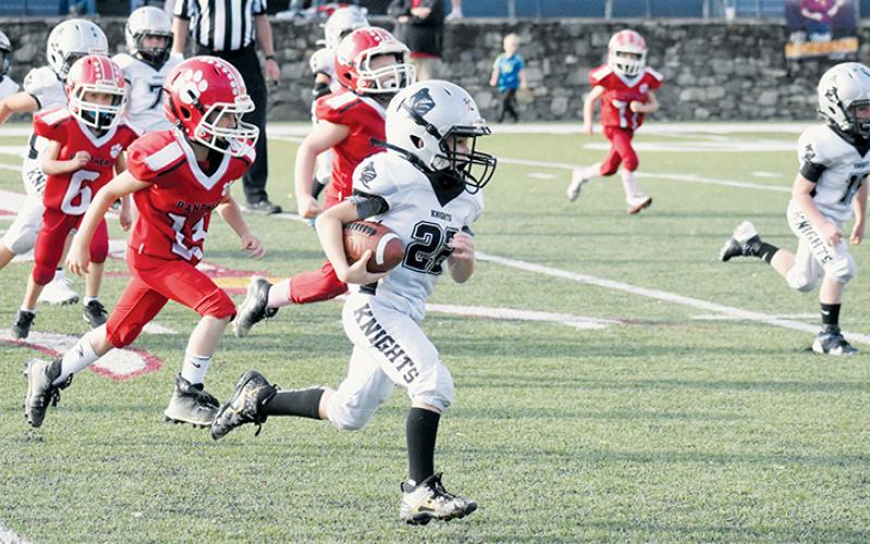 Bass Woods scored the final touchdown of the Robbinsville PeeWees’ season and recorded a pair of conversion runs in Saturday's Cracker Bowl game against Franklin. Photos by Lexie Anderson/The Graham Star