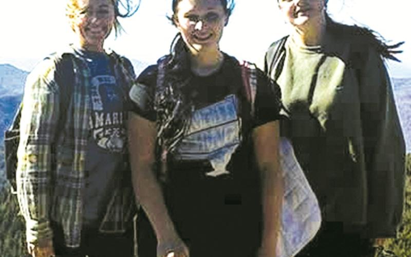 Robbinsville High School CTE Instructor Megan Williams (left) joins students Ashley Howell (center) and Jazmin Crisp atop Mount LeConte during the program's recent field trip.