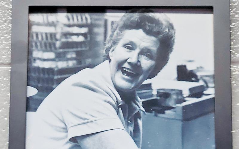 This photo of Nan Hill sits inside the Robbinsville Elementary School Cafeteria as a tribute to the former lunchroom worker. A new fund has been set up to help assist students with food purchases in her honor.